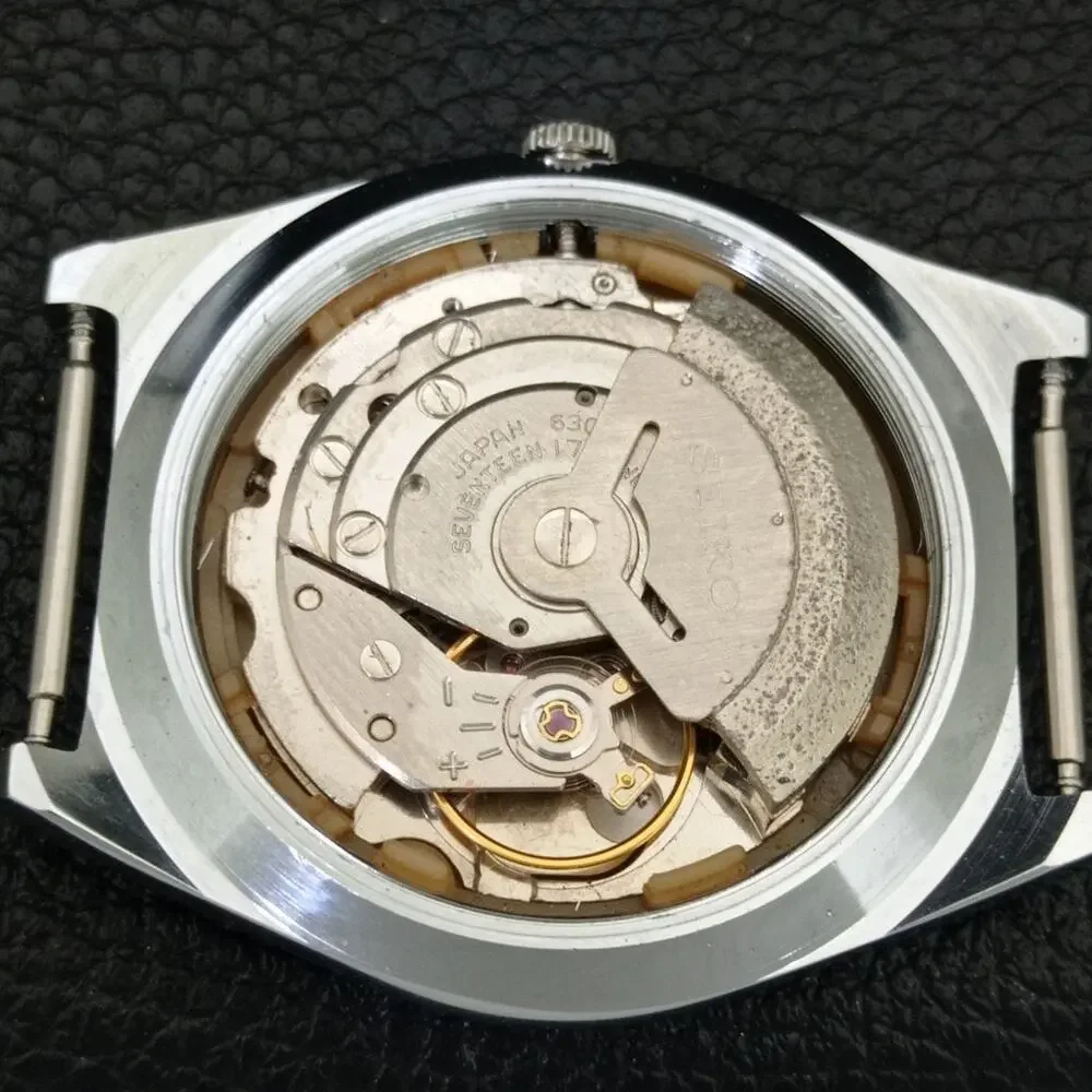Vintage 1974 Seiko Automatic Mens Silver Watch W/daydate & Yellow accents - Picture 9 of 10